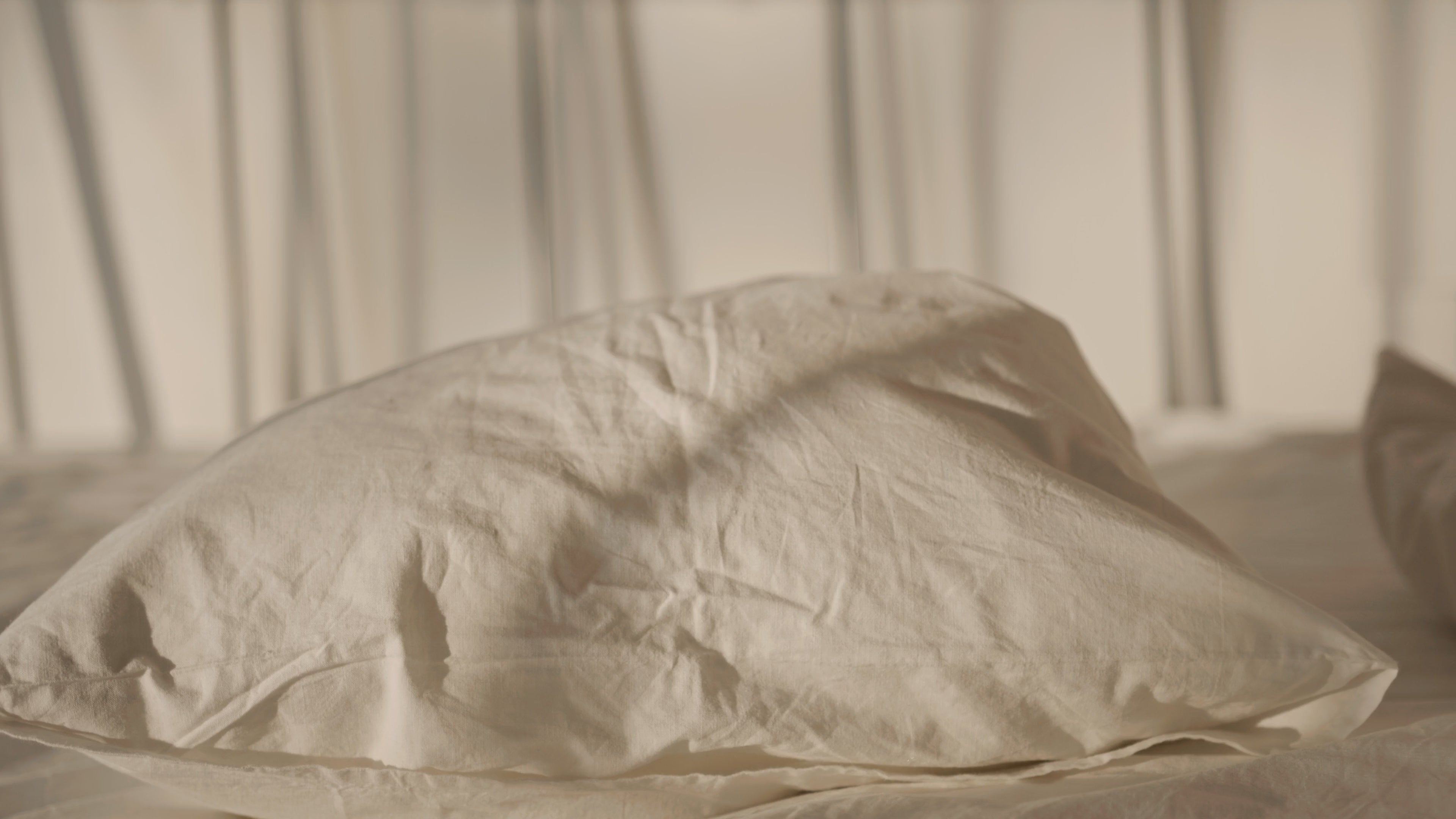 Load video: Video Showing Pillows on a Linen Bed